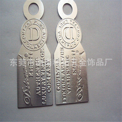訂制金屬浮雕logo吊牌 精美品牌外貿(mào)吊牌的制造藝術(shù)與市場價值